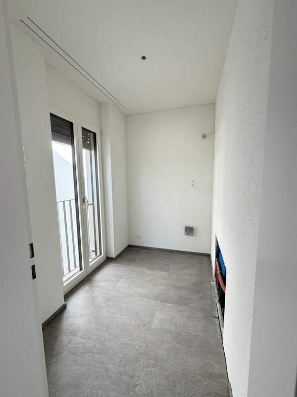 Neubau 3.5 Zimmer-Wohnung mit Tiefgarage 1. OG - Bild 13