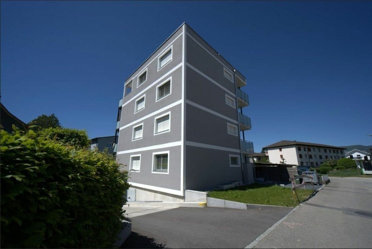 Neubau-Mehrfamilienhaus mit 4 Wohnungen und Einstellhalle - Stockweg 6, Studen BE - Bild 1