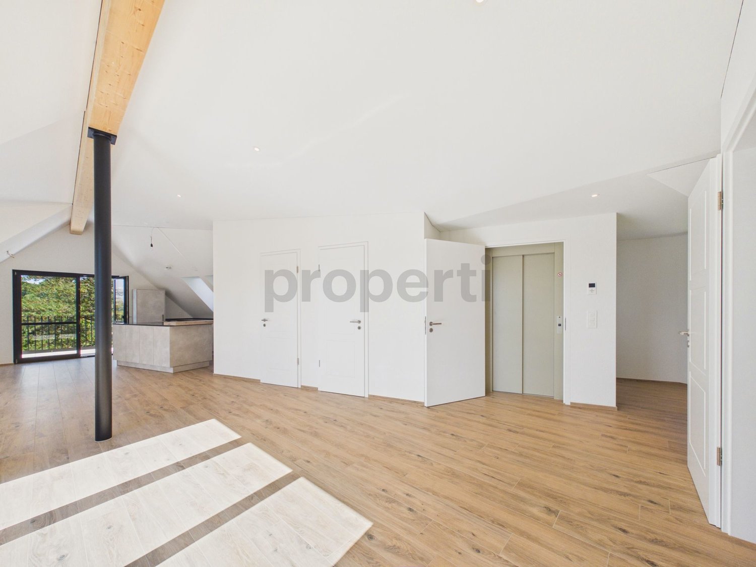 Attikawohnung direkt am Waldrand mit Zürichseeblick, Minergie-Standard und Free-Cooling - Image 4