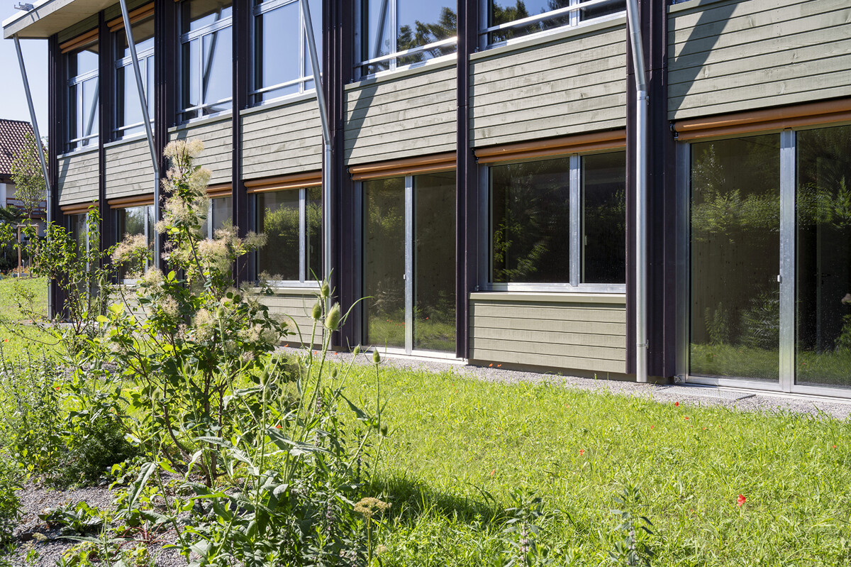 Aussergewöhnliche Design-Reihenhäuser an privilegierter Lage über dem - Rückseite Garten