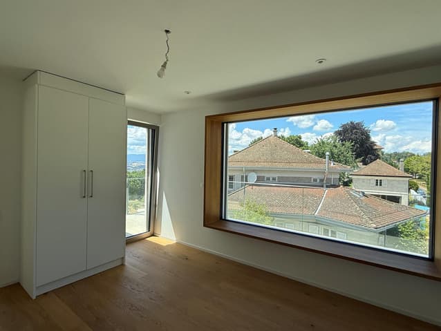 2.5 pièces en attique avec grande terrasse et vue sur le lac - Bild 7