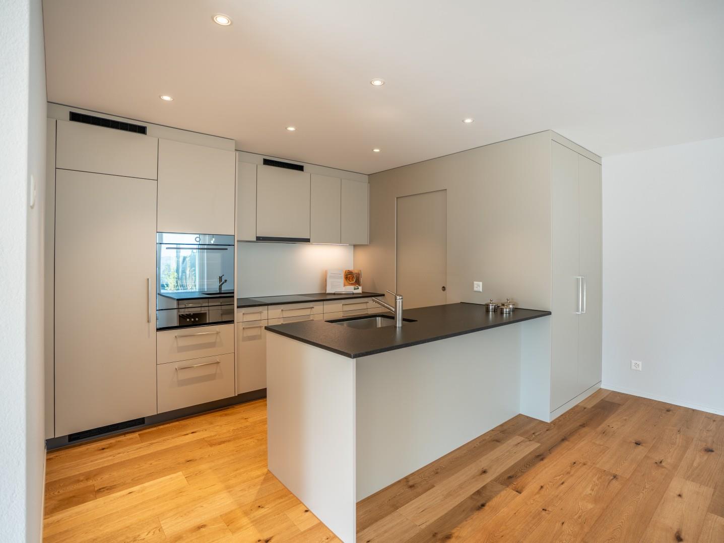 Erstbezug: Familienparadies an sonniger Lage - Küche mit Reduit