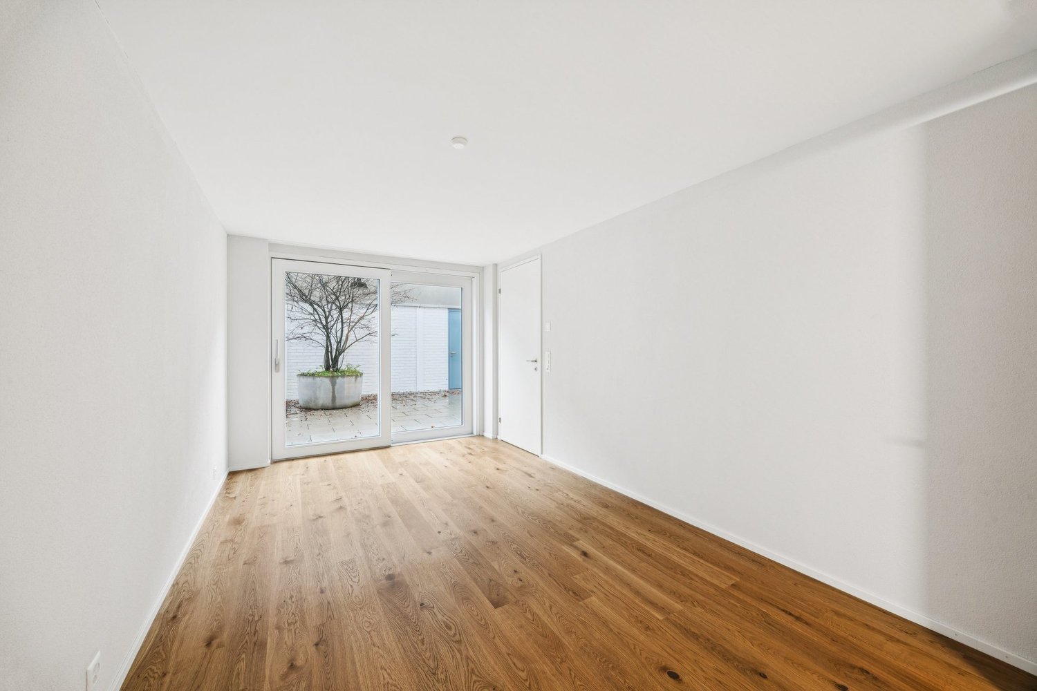 Moderne 2.5-Zimmer-Neubauwohnung direkt am Bahnhof - Zimmer