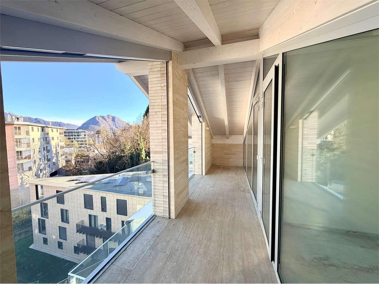 Affittasi moderno 3.5 locali mansardato - Bild 1