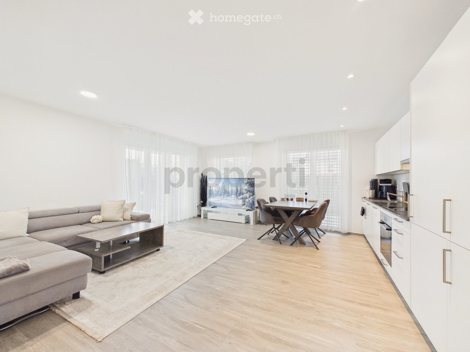 Helle 3.5-Zimmer Gartenwohnung mit 2 Sitzplätzen in Embrach - Bild 1