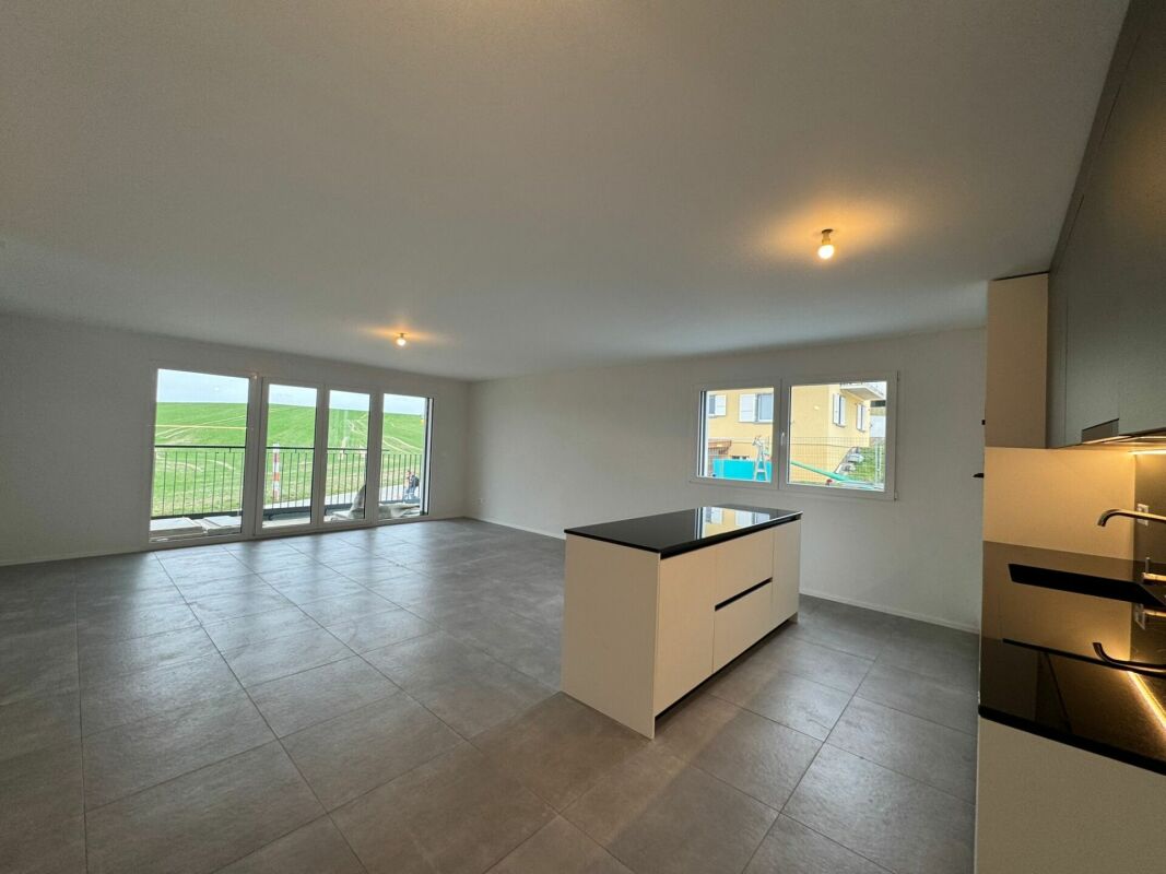 Appartement neuf de 2.5 pièces au rez-de-chaussée à Farvagny - Bild 1