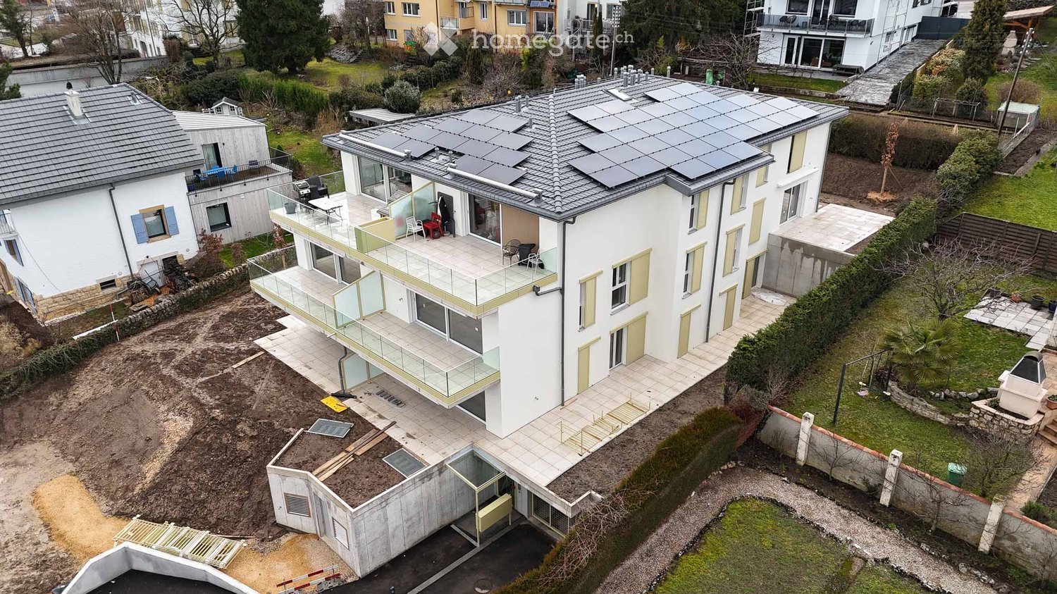 2.5 pièces neuf avec terrasse de plain-pied et jardin – Corcelles - Bild 1