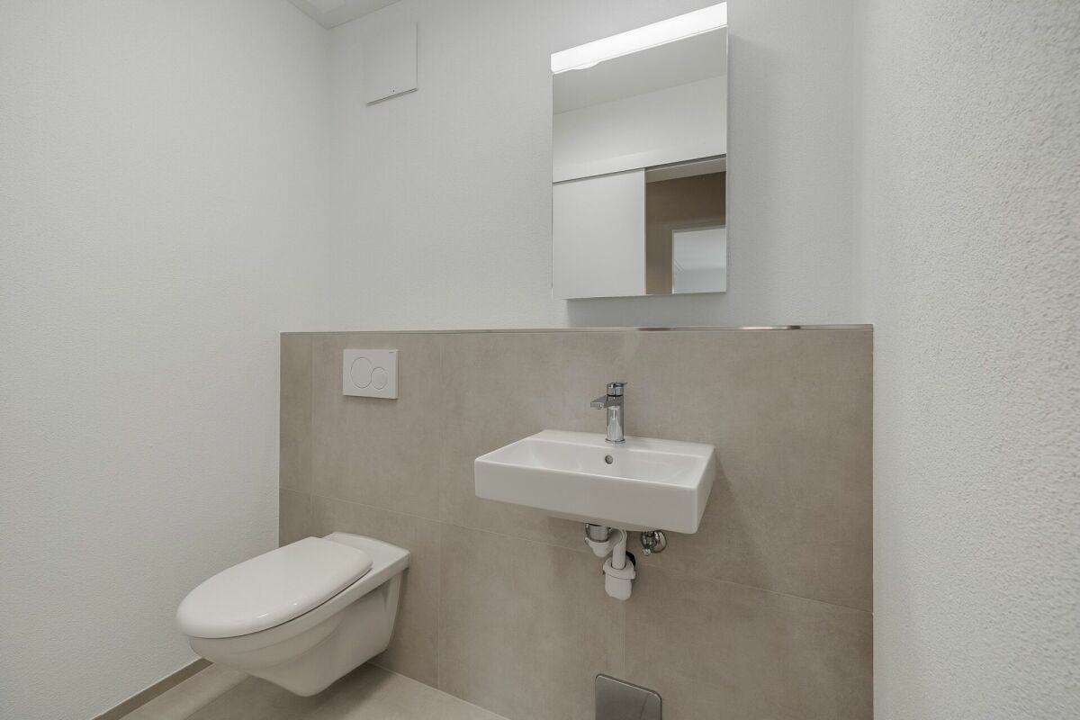 Erstvermietung - Attraktive 3 1/2-Zimmer-Gartenwohnung mit Loggia und Gartensitzplatz im Zentrum von Sissach - Bild 4