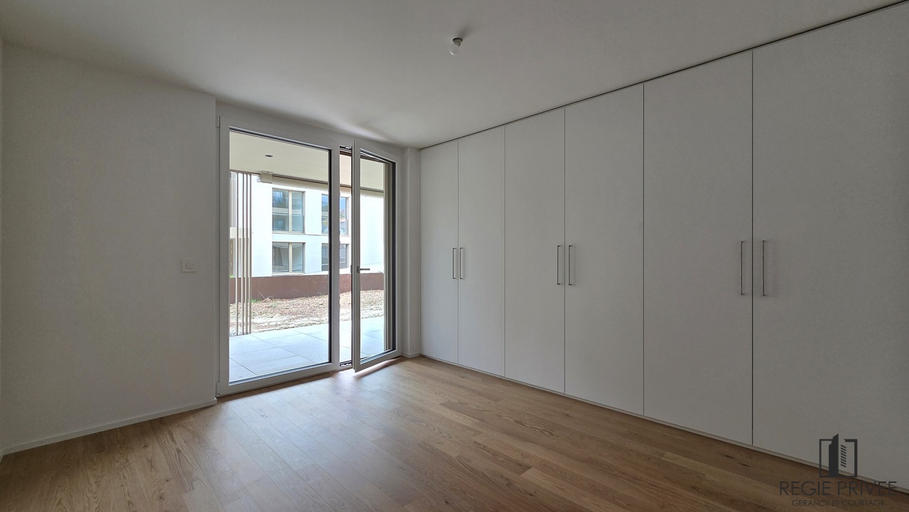 2.5 pièces neuf de standing avec jardin - Chambre