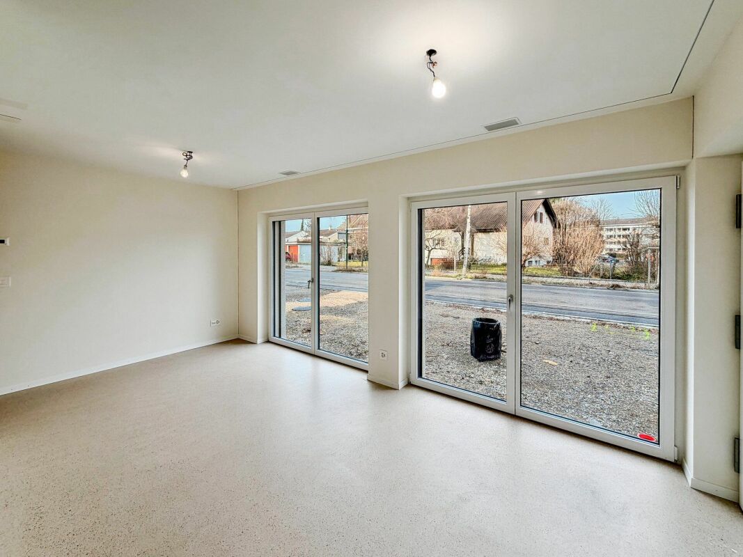 Neubau 1.5-Zimmerwohnung mit Sitzplatz in Muttenz - Bild 1