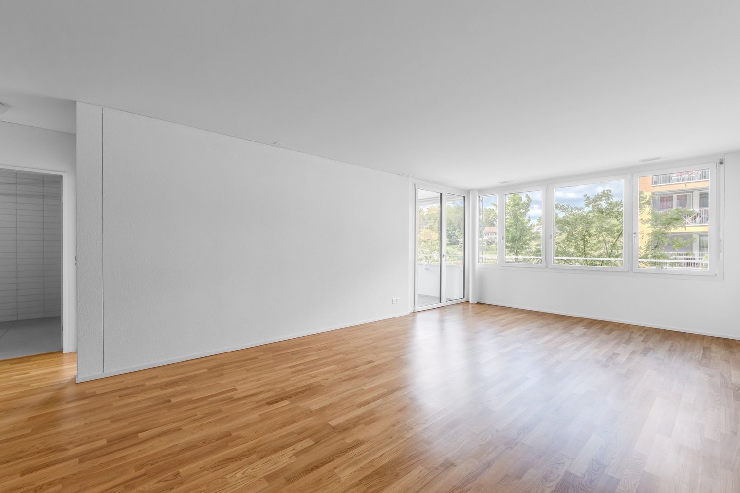 Moderne 2.5 Zimmerneubauwohnung in Emmen - Wohnzimmer