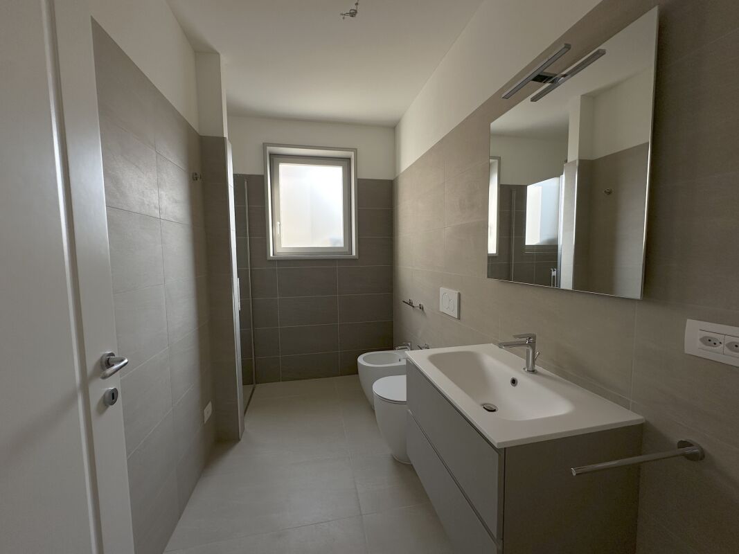 CHIASSO - Moderno bilocale con grande giardino in prima locazione - Bild 8