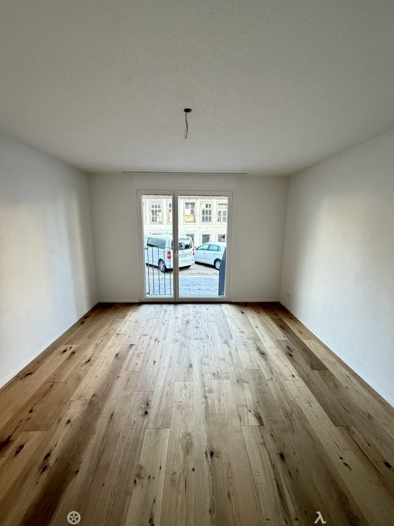 3.5-Zimmer-Wohnung mit Gartensitzplatz! Neubau 2025 - Zimmer_links.jpeg