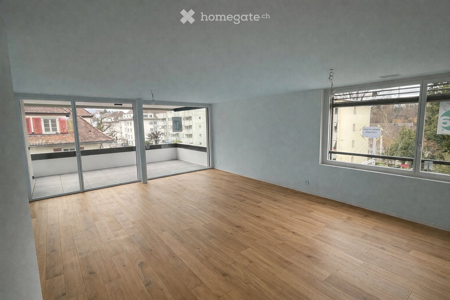 Moderne 3.5-Zimmer-Neubau-Wohnung mit Balkon und Stadtblick - Bild 3