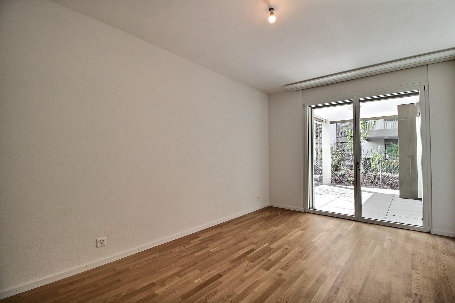 Charmant appartement de 2.5 pièces au rez-de-chaussée ! - Chambre