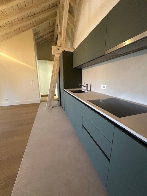 Découvrez ce 3,5 pièces unique sous-gare! - cuisine.jpg