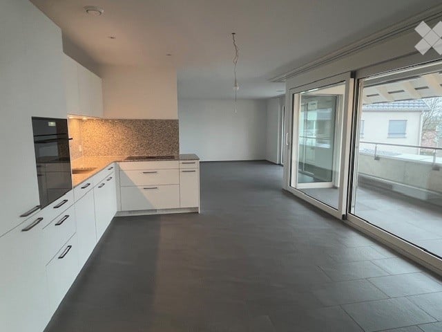 Neubau: Grosszügige 2.5-Zimmer-Wohnung an zentralster Lage - Bild 1