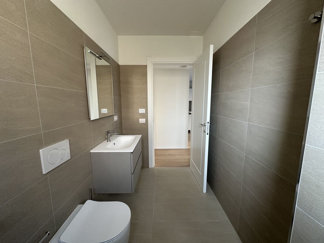 CHIASSO - Moderno bilocale con grande giardino in prima locazione - Bild 9