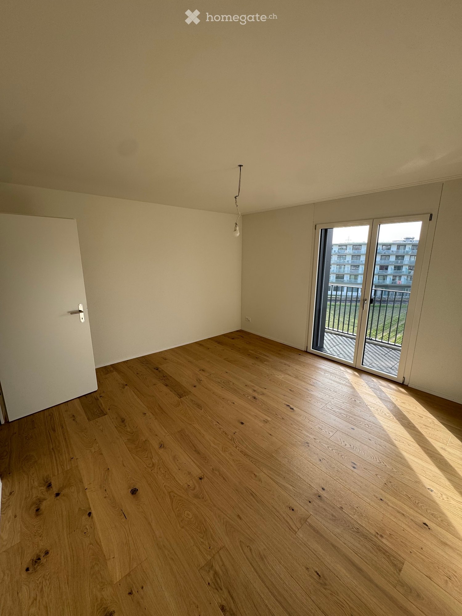 Neubau-Erstbezug in Buchs ZH: 2.5 Zimmer im Grünen & absolut zentral - Bild 7